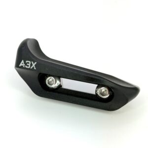 Close-up of a black metal component with the text A3X, showing two silver bolts and a curved edge.